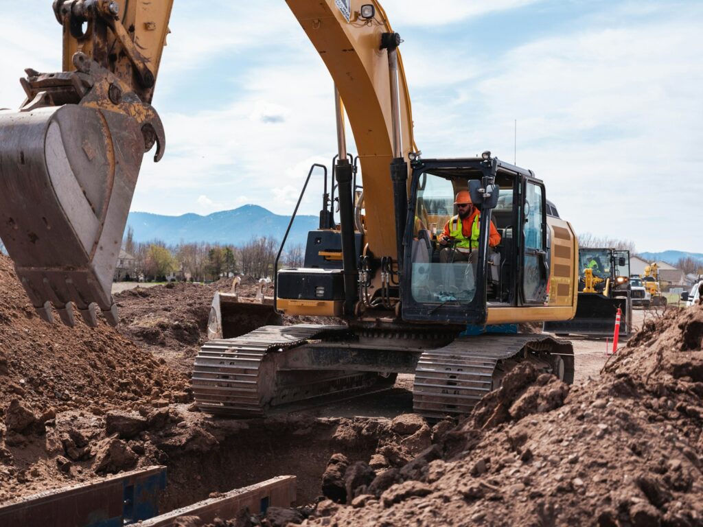 A bulldozer in a dirt field