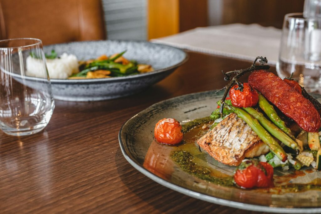 Cooked food on stainless steel plate