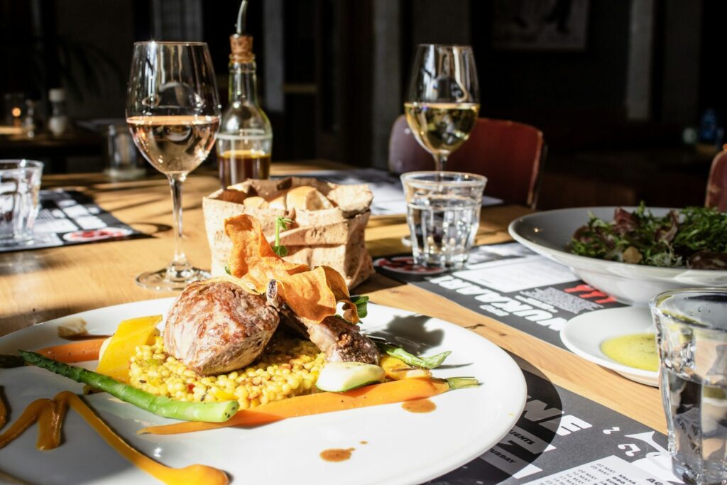 Food lot near glasses in table close-up photography